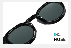 Detailed macro view of the sleek integrated nose bridge on vintage round frame sunglasses