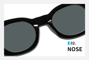 Détail du pont de nez intégré confortable sur ces lunettes de soleil noires