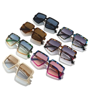 Oversized square sunglasses in assorted colors including mosaic and tortoiseshell patterns