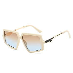 Oversized cream geometric sunglasses with brown-blue gradient lenses and gold metal temples