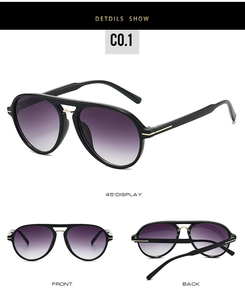 Detail view of double-bridge pilot sunglasses with purple gradient lenses and gold trim