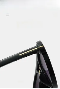 Detail of high-elastic black glasses temple with golden metal hinge inlay craftsmanship