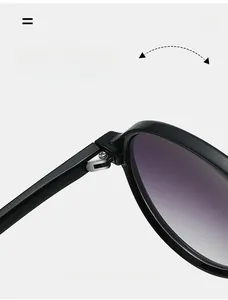 Close-up of durable metal hinge on black double bridge retro sunglasses with purple lenses