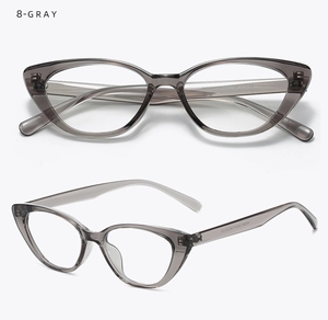 Detail view of transparent gray cat-eye frames with silver metal hinge accents