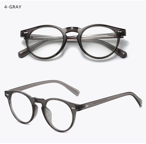 Detail view of translucent gray TR90 retro glasses frames with double metal rivet accents