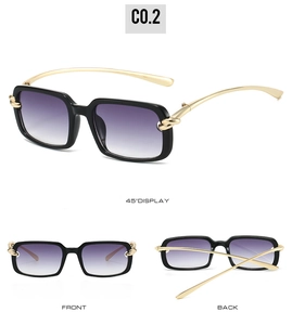 Détails lunettes carrées avec verres dégradés violets et branches en métal doré tressé