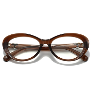 Deep amber cat eye glasses frames with metal heart detail and blue light blocking lenses