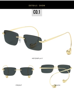 Detailansicht der randlosen quadratischen Sonnenbrille mit goldfarbenen Bügeln