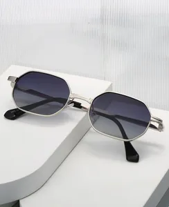 Detailed view of silver metal octagonal sunglasses with gradient lenses on a white pedestal