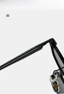 Detail view of lightweight elastic metal sunglasses hinges and flexible black frames