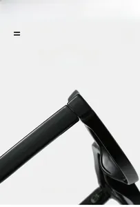 Macro detail of the super elastic hinge and lightweight black frame of these sunglasses