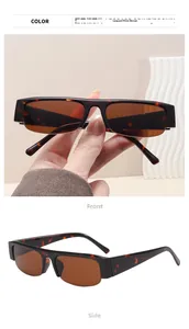 Detail view of leopard print rectangular semi-rimless sunglasses with brown lenses