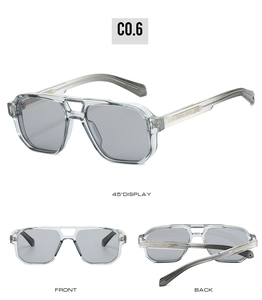 Detail view of translucent grey pilot sunglasses with a classic double bridge design
