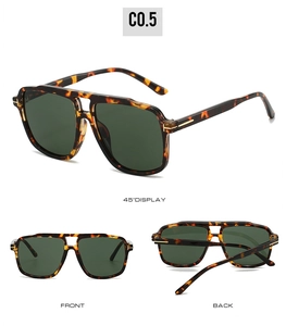 Detail view of double-bridge pilot sunglasses with leopard frame and green lenses