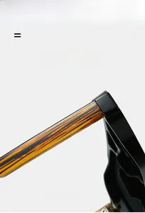 Detail of pilot sunglasses with matte tortoiseshell temples and metal hinge structure