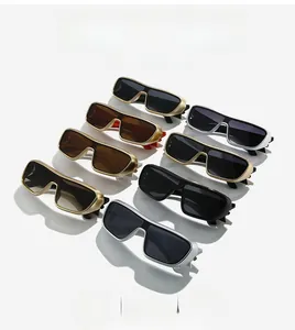 Top view of sports sunglasses collection in gold, silver, and black metal frames