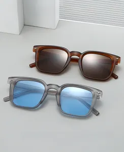 Detail view of 2025 square fashion sunglasses with arrow rivet decoration and tinted lenses