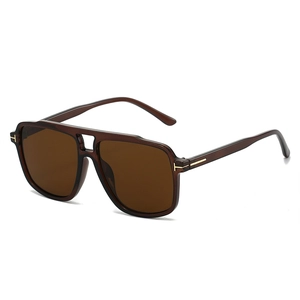 Classic double-bridge pilot sunglasses with tortoiseshell frames and gold T-shaped detail