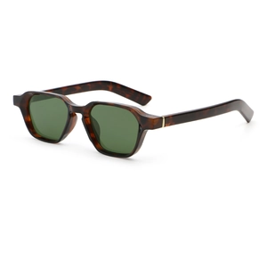 Classic tortoise frame sunglasses with dark green lenses and gold metal details
