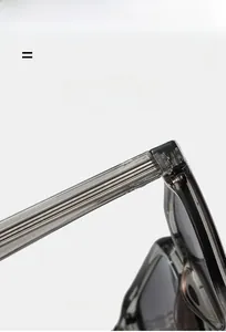 Detail of square sunglasses showing high elastic frame and durable metal hinge components