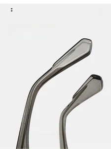 Macro view of gray translucent curved sunglasses temples for comfortable ergonomic wear