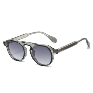 Lunettes de soleil rétro à monture ronde grise transparente et verres dégradés violets