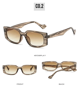 Detailed view of square brown tortoise shell sunglasses with gradient lenses