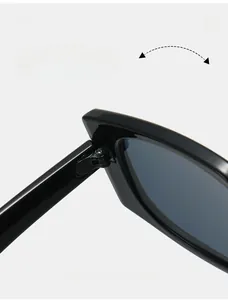 Close-up of durable reinforced metal hinges on black square fashion sunglasses