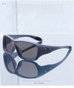 Detail view of matte blue-purple sports sunglasses frame with metallic temple accents