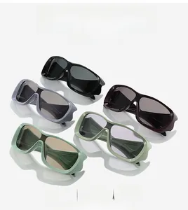 Flat lay of oversized sports sunglasses in five assorted trendy colors for outdoor use