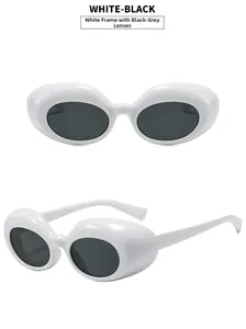 Détail de lunettes de soleil ovales blanches épaisses avec verres gris de face et de profil