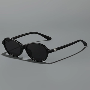 Classic oval black sunglasses with glossy frame and silver metal temple accents