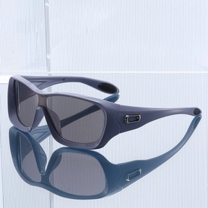Fashionable oversized sport sunglasses with matte blue frame and dark grey polarized lens