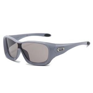 Oversized sporty sunglasses with light grey frame and grey shield lenses for outdoors
