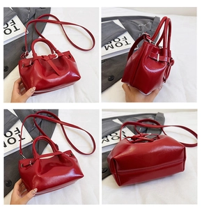Detailed multi-angle views of a glossy red patent leather tote bag with strap and buckles