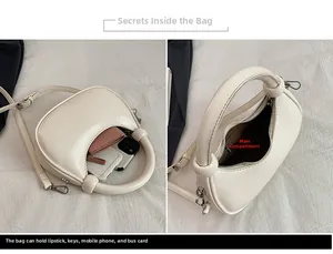 Interior detail of a white half-moon bag showing storage for phone and essentials