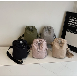 Detailed collection of colorful nylon crossbody bags with drawstring closure and wide straps