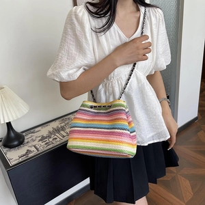 Colorful hand-woven bucket bag with metal chain strap for summer vacation casual wear