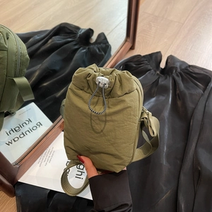 Army green drawstring nylon mini crossbody bag with adjustable strap and casual style