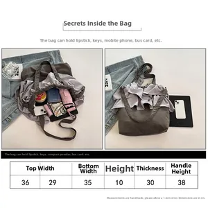 Tableau des tailles détaillé pour grand sac seau en toile avec volants et mesures