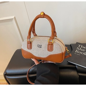 Canvas and leather bowling handbag with PAN TOR lettering and adjustable shoulder strap