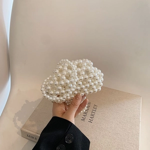 Elegant mini pearl beaded handbag for women featuring a cloud-shaped woven design with chain
