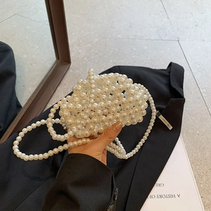Elegant white pearl beaded mini handbag with long pearl chain strap for women