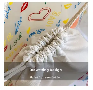 Close-up of a white canvas drawstring pouch showing the textured fabric and rope closure