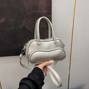 Silver metallic pebble leather mini handbag with top handles and shoulder strap