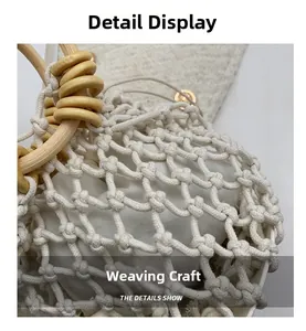Detail of hollow hand-woven beige tote bag with round wooden handle and drawstring liner
