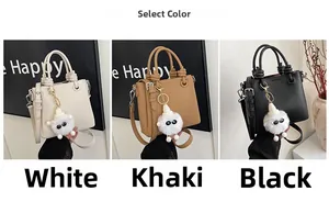 Three-color options for litchi grain leather crossbody bags with plush monster charms