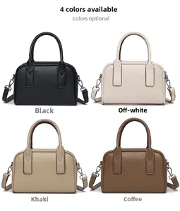 Detailed comparison of four classic colors for a leather bowling bag with twin handles