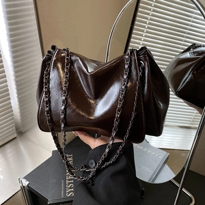 Retro dark brown glossy leather chain shoulder bag with stylish pleats and a modern finish
