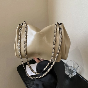 Retro cream chain shoulder bag in glossy leather with polished finish and layered design